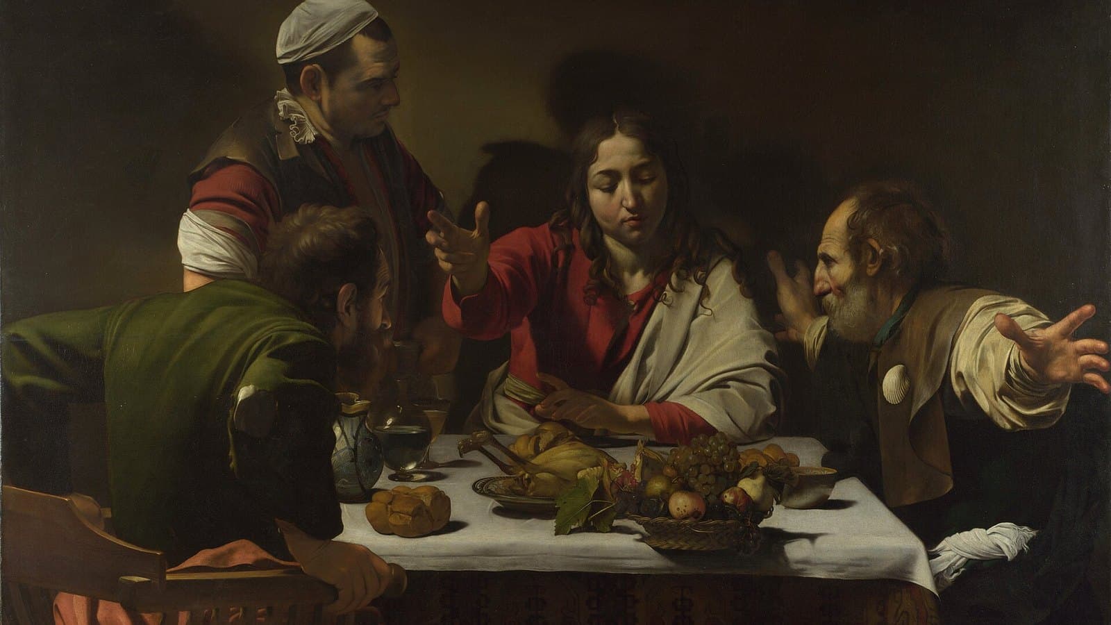Caravaggio's Supper at Emmaus — Christ blessing the bread at table as two disciples recognise him.