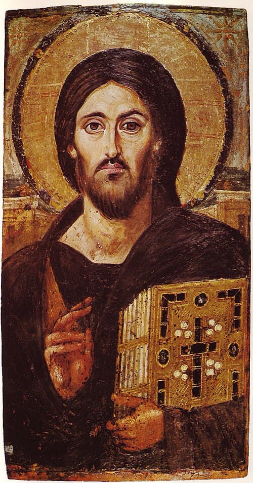 Christ Pantocrator, a sixth-century icon from Saint Catherine's Monastery, Sinai, holding a book of the Gospels.